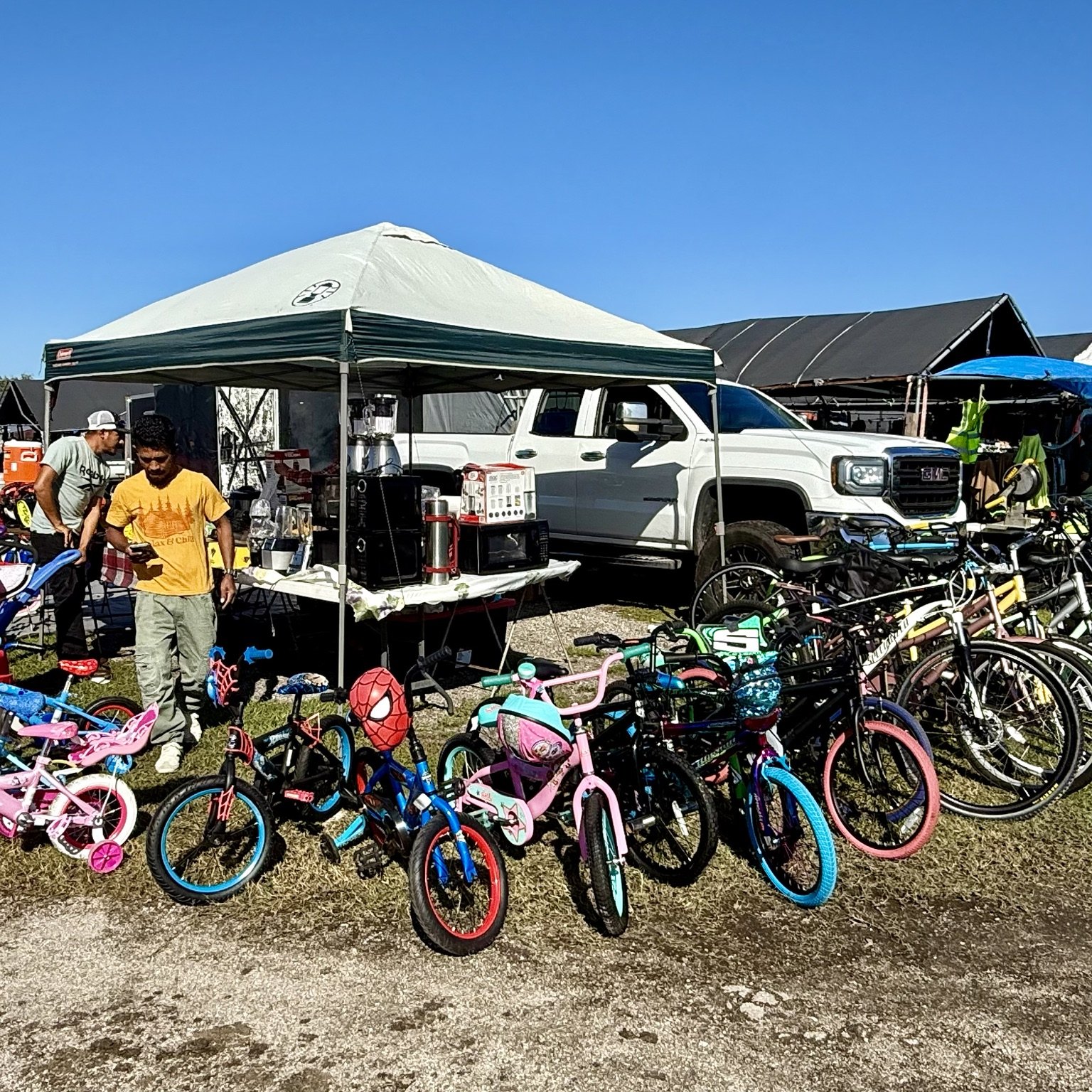 Outdoor market vendors and bicycles